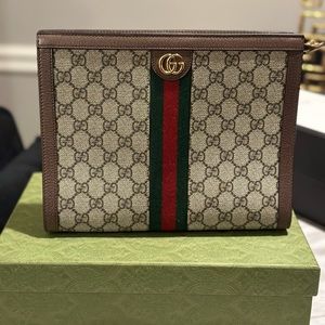 Gucci Ophidia Pouch Retail at $895 practically brand new.